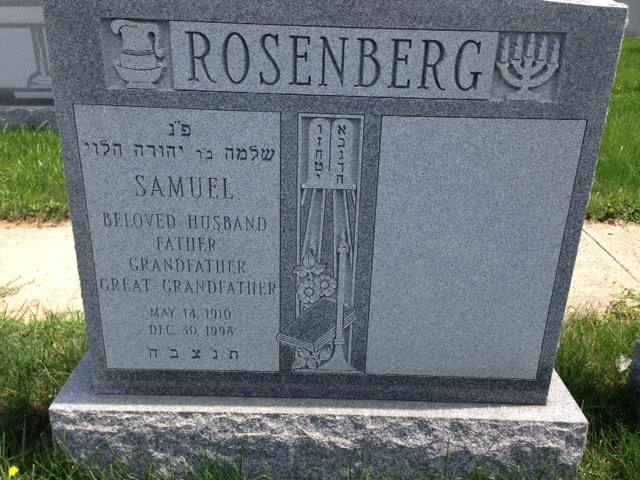 double jewish headstone with inscription and lettering on left side