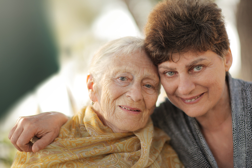Jewish mother and daughter at cemetery